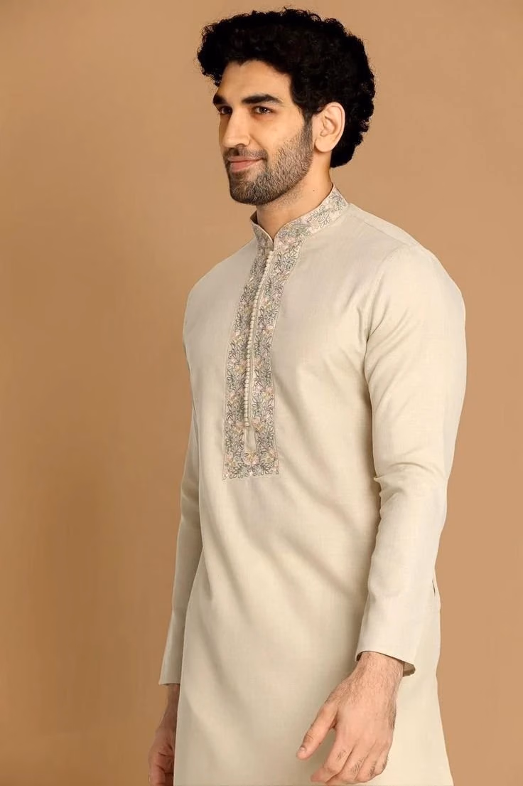 Model wearing a sand coloured embroidered panjabi